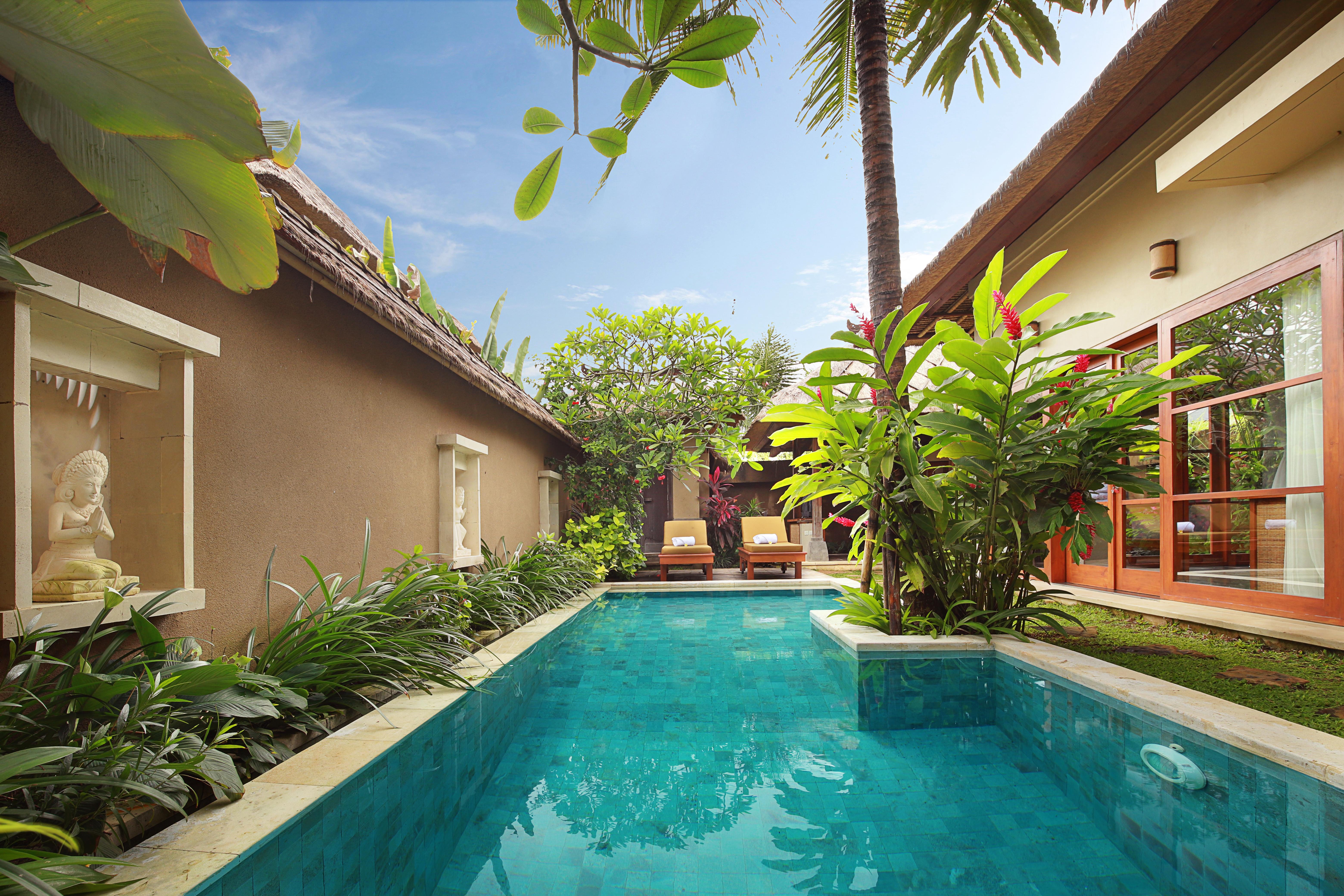 우붓 뉴 발리 리조트&스파 외부 사진 A swimming pool in Bali, Indonesia